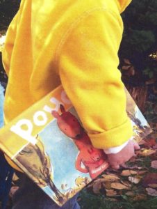 Boy carrying book, Pouch