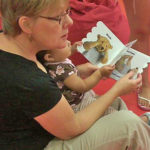 grandmom reading to grandaby